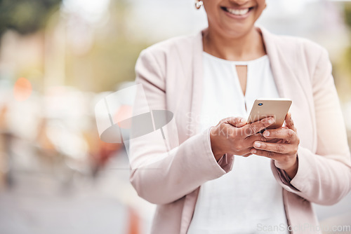 Image of Woman, hands and phone in city for social media, communication or chatting and texting. Hand of female with smile on smartphone for 5G connection, talking or networking in road of an urban town