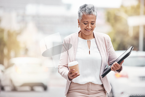 Image of Corporate senior woman, city and walk with coffee, folder and excited for financial service career. Accountant, happiness and smile by blurred background in metro, street or motivation for accounting