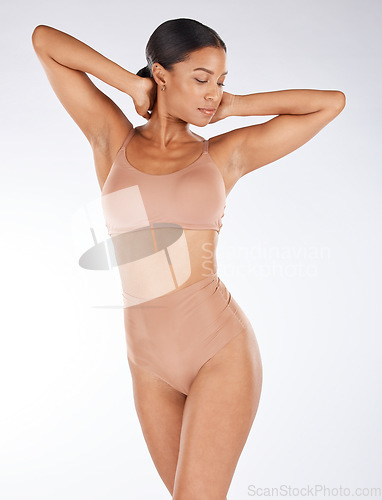 Image of Body, underwear and beauty black woman isolated on a white background for skincare, cosmetics and aesthetic. Young lingerie model or person in studio mockup for dermatology or hair removal results