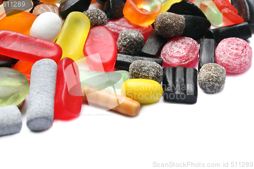 Image of colored candies over white background