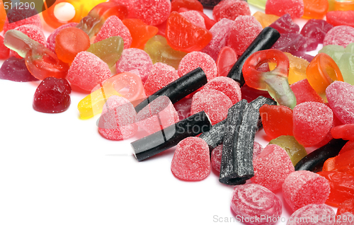 Image of colored candies over white background