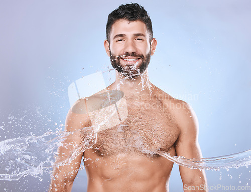 Image of Skin care, face and water splash man portrait for clean facial for beauty hygiene and dermatology. Aesthetic model person on blue background for health and wellness cosmetics, body and detox mockup