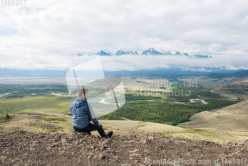 Image of Relaxing man in Kurai steppe on North-Chui ridge