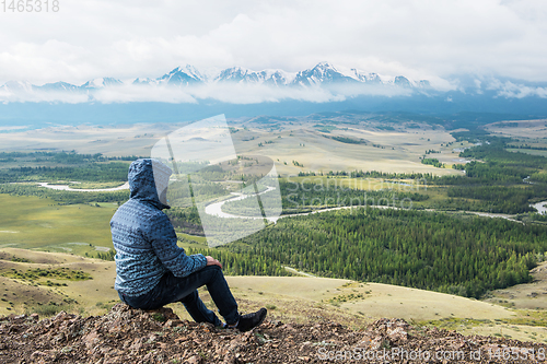 Image of Relaxing man in Kurai steppe on North-Chui ridge