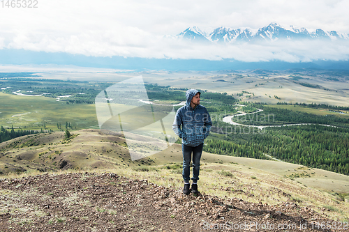 Image of Relaxing man in Kurai steppe on North-Chui ridge