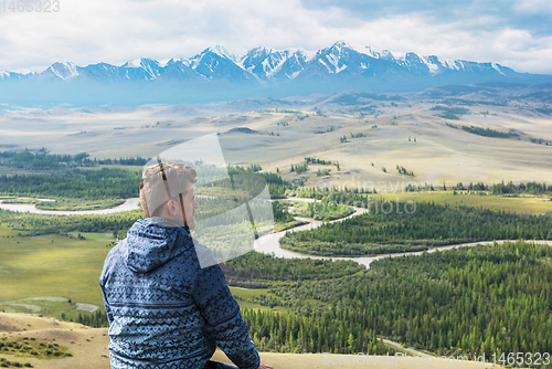 Image of Relaxing man in Kurai steppe on North-Chui ridge