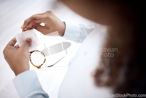 Image of Lens cleaning, girl hands and glasses of a young student with fabric cloth to clean dust. Vision eye care, home and reading eyeglasses of a person holding frame for disinfection and eyewear safety