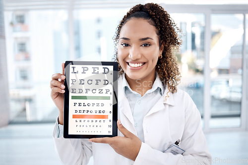 Image of Eye chart, portrait and doctor with tablet in hospital for vision examination in clinic. Healthcare, snellen touchscreen and optometrist or woman holding technology with text or letters for eyes test
