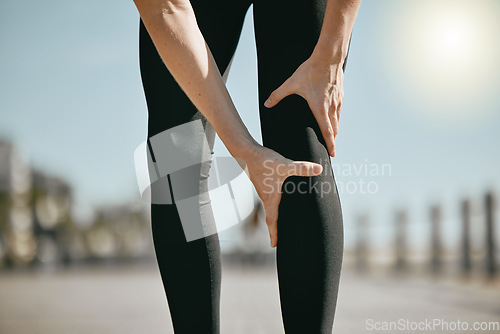 Image of Fitness, pain and hands holding leg while running, exercise accident and knee problem while training. Injury, emergency and woman with a muscle strain, ligament sprain and body spasm during a workout
