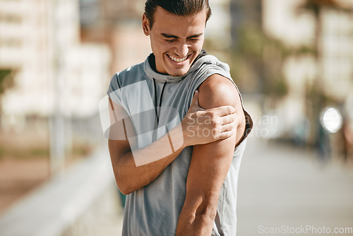Image of Fitness, arm pain and man with injury after workout, exercise or training accident in city. Sports, health and male athlete with fibromyalgia, inflammation or arthritis, broken bones or painful arms.