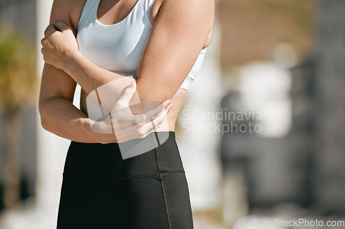 Image of Pain, fitness and woman with broken arm after running, cardio injury and sprain after exercise in city. Bad, sports and athlete runner with a body accident, muscle strain and injured California