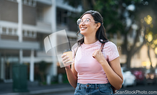 Image of Travel, coffee and woman walking in a city building with freedom on a urban adventure in Italy. Relax, smile and morning drink of a young person on vacation with happiness and backpack outdoor