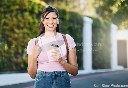 Image of Travel, coffee and happy woman portrait by a city building with freedom on a urban in summer. Relax, smile and morning drink of a young person on vacation with happiness and backpack outdoor