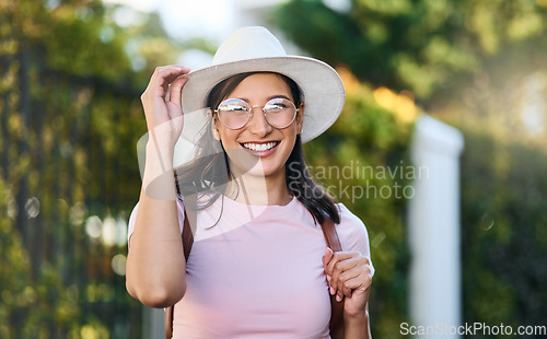 Image of Woman, portrait and park of a young person in London happy about nature, travel and freedom. Happiness, smile and laughing female with blurred background in a garden feeling relax and summer fun