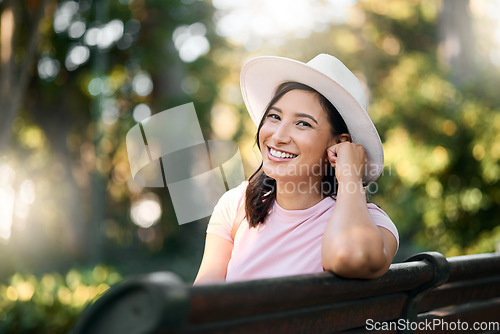 Image of Woman, park bench and portrait of a female with bokeh in a Japanese garden with a smile from travel. Freedom, happiness and face of a Asian person on holiday feeling happy on vacation with mockup