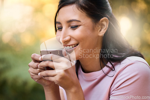 Image of Happy, mockup and woman relax with coffee, content and satisfied against a blurred background. Smile, space and girl with tea at outdoor cafe, peaceful and calm while enjoying the day off on bokeh