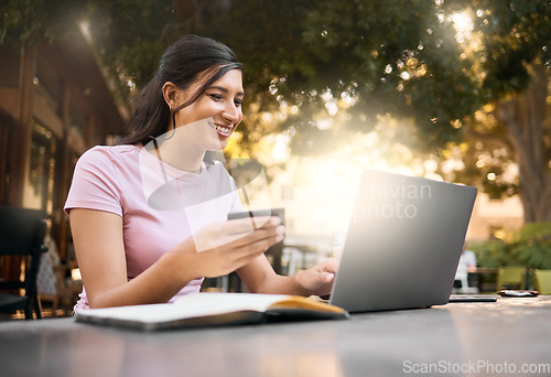 Image of Credit card, happy woman and laptop banking data of a female checking savings, budget and bills. Financial payment planning, ecommerce and accounting info of a young person online doing web finance