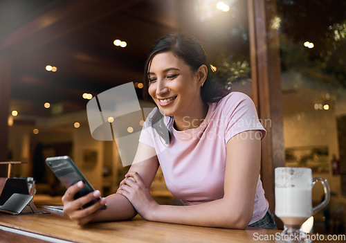 Image of Cafe, search or student woman on phone in morning for social media, networking or reading comic blog. Smile university or girl on smartphone at college coffee shop for learning or internet media app