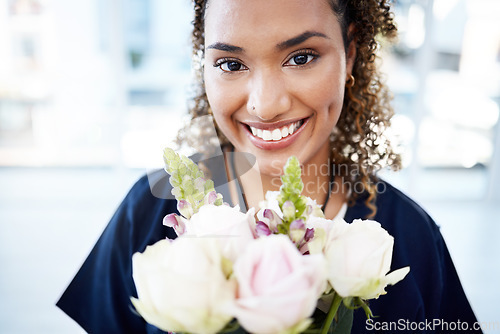 Image of Portrait, therapist and woman with flowers or roses smile, happy and holding a gift or present feeling excited. Bouquet, happiness and medical professional in celebration for a promotion