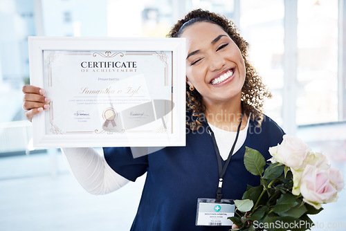 Image of Certificate, flowers and portrait with a black woman graduate or nurse in the hospital, proud of her achievement. Smile, graduation and qualification with a happy young female standing in a clinic