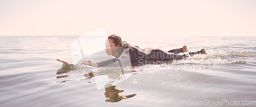 Image of Surfer, woman and swimming in waves, sea and ocean for summer adventure, freedom and sky mockup. Female surfing on board in water, beach and relax for tropical holiday, nature travel and peace sports