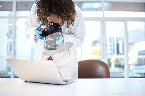 Image of Science investigation, camera and black woman with laptop in laboratory for forensic research with evidence. Photography, police and girl take picture for crime analysis, analytics and observation