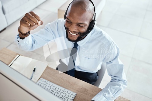 Image of Customer service computer, consulting celebration or happy man telemarketing on contact us CRM or African telecom. Call center fist pump, online ecommerce or excited information technology consultant