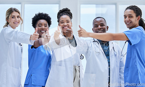 Image of Doctors, nurses and portrait in thumbs up for teamwork, support and hospital diversity mission. Professional medical people or women with employees for healthcare like, vote or thank you emoji hands