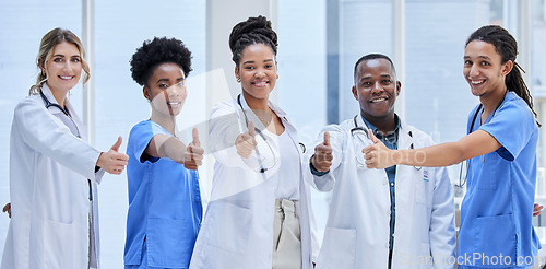 Image of Portrait, team of doctors and thumbs up for teamwork, support and hospital services mission. Medical nurses, people or diversity employees face for healthcare like, vote and thank you emoji hands