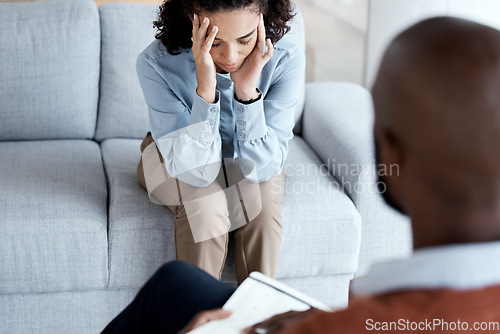 Image of Counselling, therapy and depression of black woman with mental health problem on psychologist couch. Patient person talking to therapist man about psychology, anxiety and trauma or stress for help