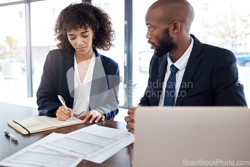 Image of Lawyer, consultant and documents with a business team working on a desk in an office for growth. Contract, meeting or financial advisor with a man and woman employee at work in collaboration