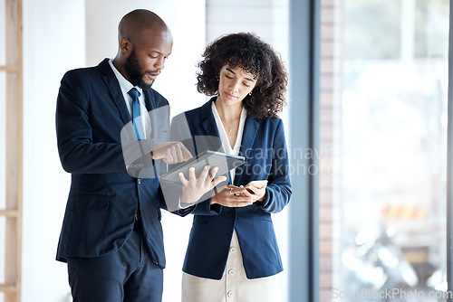 Image of Black people, tablet and checking data, schedule or digital marketing in corporate networking at the office. Employee man and woman with touchscreen in planning for business idea or market strategy