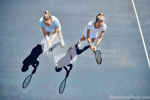 Image of Woman, tennis and friends in team match, game or sports together standing ready above on the court. Women in fitness sport, competition or club with racket stance for teamwork, exercise or training