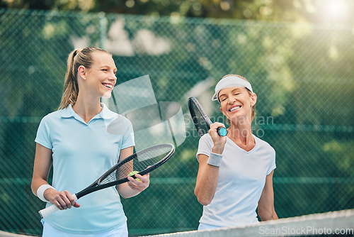 Image of Tennis, women friends and sports on outdoor court for fitness, exercise and training. Healthy people or team talking at club about game, workout and performance for health and wellness with cardio
