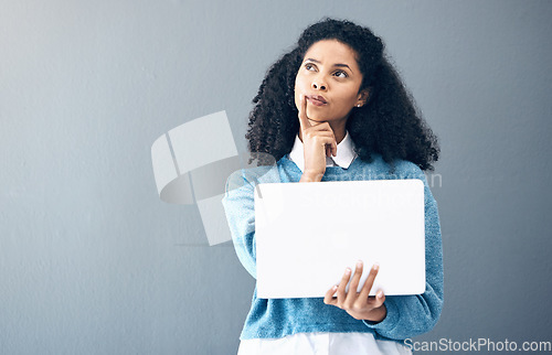 Image of Inspiration, ideas and woman holding a laptop for an email, internet and communication on office wall. Contact, black woman and business employee thinking of motivation with a pc and mockup space