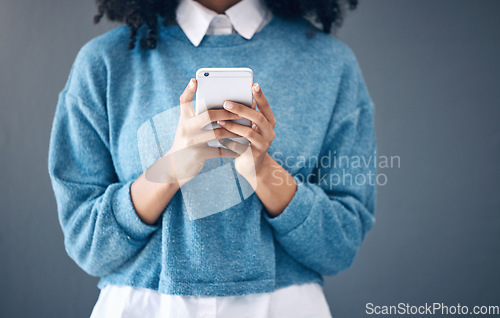 Image of Phone, hands or black woman search in studio for social media content, networking or reading blog post update. Website, startup or girl with smartphone for communication, internet news or mobile app