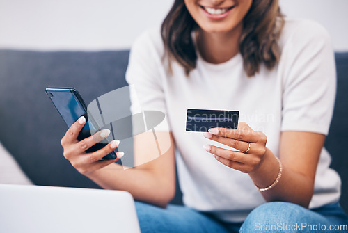Image of Ecommerce, hands or woman with credit card or phone for a digital payment on sofa relaxing at home. Smile, finance or happy girl online shopping for subscription sales offer, banking or fintech deal