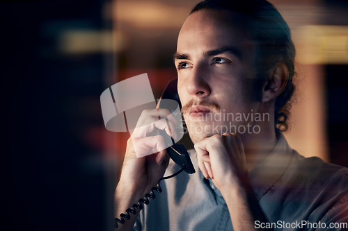 Image of Phone call, thinking and business man on telephone talking, chatting or speaking to contact at night. Technology, ideas or male working late while networking, discussion or contemplating conversation