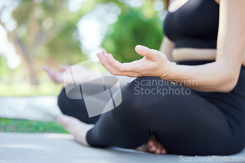 Image of Zen, health and woman doing yoga in nature for outdoor exercise for body, mind and spiritual wellness. Calm, meditation and closeup of a healthy female doing pilates workout in park, garden or field.