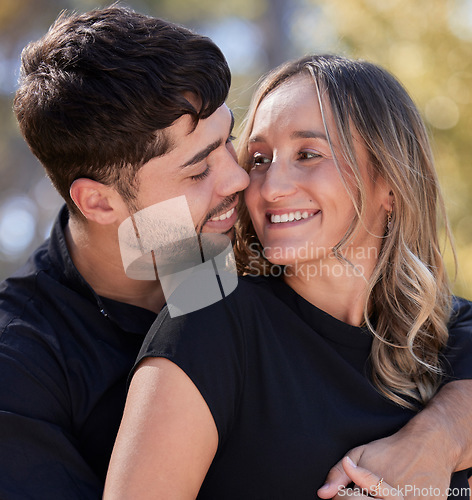 Image of Love, couple outdoor and hug with smile, celebration and dating on Valentines day, joyful and romance. Romantic, happy man and woman with happiness, break and loving with embrace, bonding or marriage