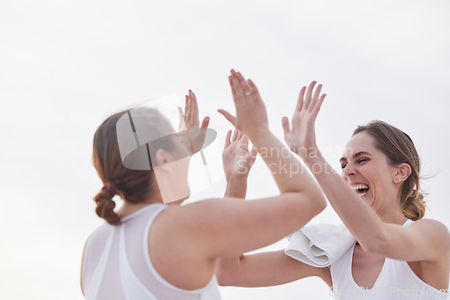 Image of Exercise, women and high five for celebration, workout goal and fitness outdoor, support and achievement. Females, athlete and girl with gesture for victory, winning and happiness for target or smile