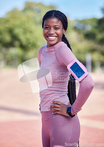 Image of Fitness, runner and portrait of black student with a smile outdoor ready for running and race. Marathon training, sport and young person with phone and blurred background with happiness from run