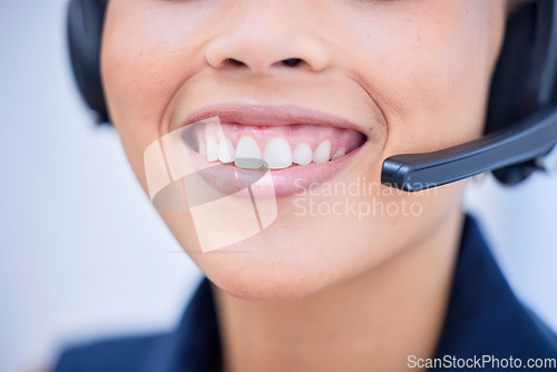 Image of Call center, teeth and smile with mouth of black woman for telemarketing, customer support and receptionist. Happy, communication and consulting with employee for advisor, service and help desk