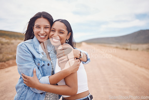 Image of Portrait, hug and friends on a road trip with mockup on a dirt road outdoor in nature for adventure together. Desert, travel or freedom with a young woman and friend hugging outsode on holiday