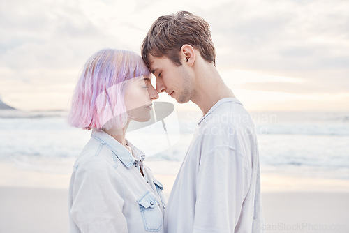 Image of Love, beach and couple with a intimate moment while on summer date for valentines day or anniversary. Romance, sea and young gen z man and woman embracing with intimacy by ocean together in Australia