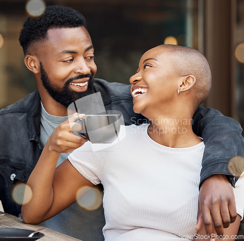 Image of Black couple, coffee and smile for date at cafe, bonding or hug spending quality time together. Happy African American man and woman relaxing, hugging or smiling for good drink and love at restaurant