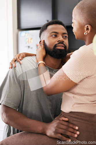 Image of Kitchen, love and black couple hugging in their home with care, support and comfort in the morning. Intimacy, affection and young African man and woman embracing with romance in their modern house.