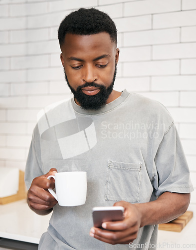 Image of Black man, smartphone and coffee in home, morning and reading notification, social media post and connection. Guy, house and cup of drink with mobile app, technology and relax to search internet web