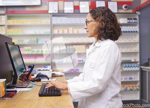 Image of Order, consultation and pharmacist typing on a computer for an email, communication and medicine. Healthcare, medical and woman on a hospital pc for information on pills, health and consulting