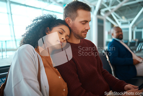 Image of Airport, travel and woman sleeping by her boyfriend while waiting to board their flight together. Tired, exhausted and female taking a nap for rest on the shoulder of her man in the terminal lounge.